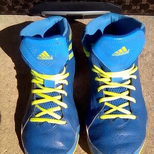 Adidas Light Blue Shoes with Vibrant Yellow Accents